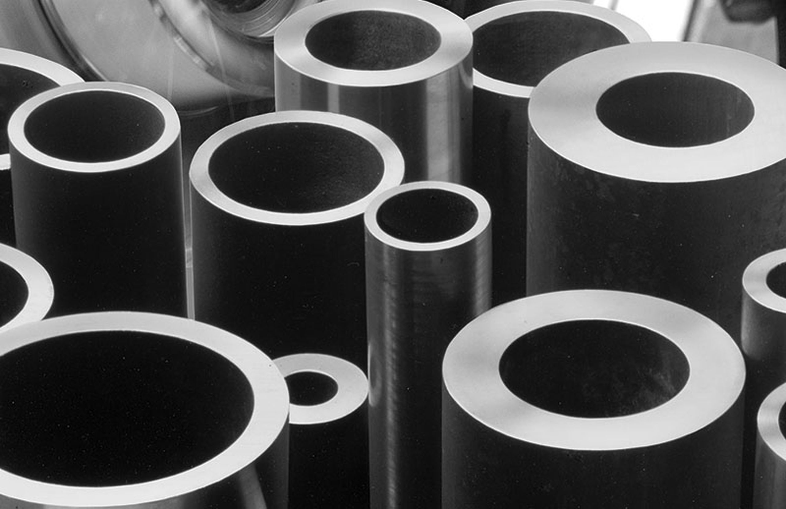 Seamless tubes and hollow bar