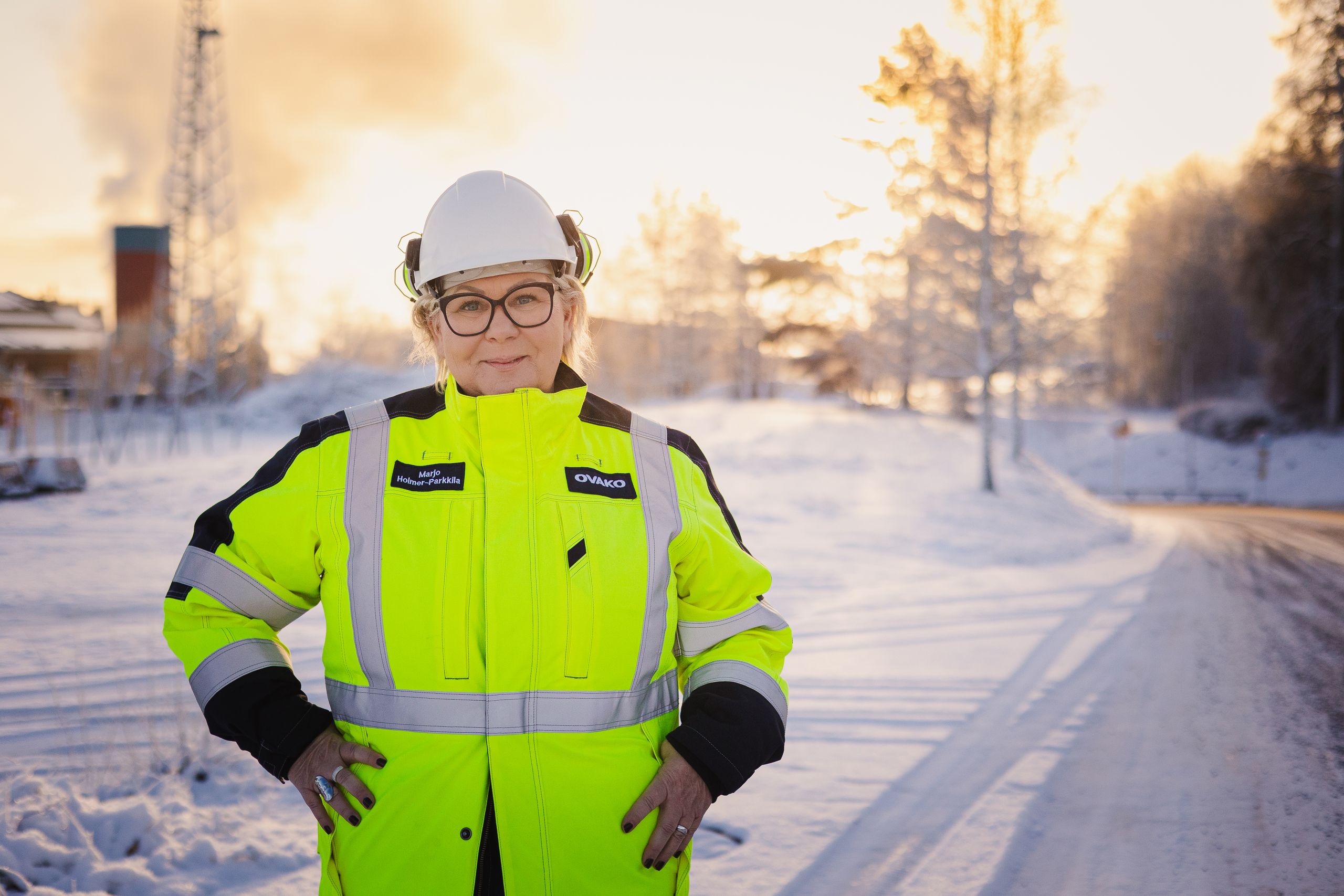 Mario standing outside of the production area in the snow in here safety gear
